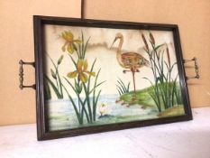 A 1920s/30s drinks tray, with painted textile panel depicting bird and flowers, handles to side (a/