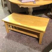 A modern pine rectangular two tier coffee table with slatted sides on square supports (40cm x