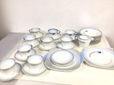 A part 1930s/40s Shelley teaset including nine teacups, twelve saucers, milk jug, side plates, two