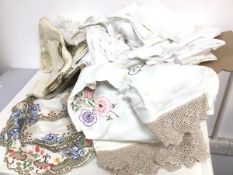 Textiles: an assortment of table cloths, bed sheets, embroidered place mats and doilies (a lot)