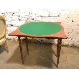 A Georgian style serpentine top card table, with circular baize swivel top, fitted two dummy