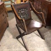 A carved walnut Glastonbury pattern chair with oak leaf and acorn carved top and pierced carved