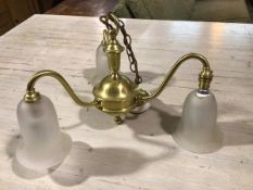 A brass three branch pendant light fitting with opaque glass shades (one a/f) (drop: 33cm x d.43cm)