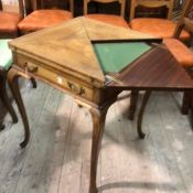 A Victorian walnut envelope foldover card table with baize lined interior, fitted single drawer on