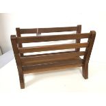 A mid century teak magazine rack (31cm x 41cm x 19cm)