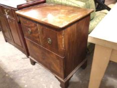 A 19thc mahogany side cabinet, the rectangular top with boxwood strung border, above a pair of panel