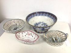 An early 20thc large footed bowl with Chinese inspired decoration, staple repairs (15cm x 33cm), a