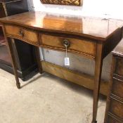 A reproduction mahogany serpentine side table fitted two frieze drawers, raised on square tapered