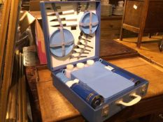 A Sirram blue vinyl picnic case complete with twin flasks, plates, original knives, forks etc. (13cm
