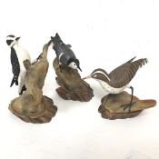 A Wedgwood china figure, First Edition Canadian Spotted Sandpiper, no.365/500, a Downy Woodpecker,