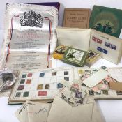 A schoolboy's stamp collection, dated May 1900, together with a Victory stamp album with mint stamps