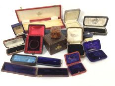A collection of vintage jewellery boxes including stick pin cases, pocket watch holder, ring