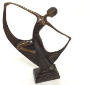 A modern Art Deco inspired cast bronze Dancing Female Figure, raised on stepped rectangular base (