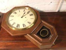 An early 20thc American school Seth Thomas wall clock with walnut case, retailed by S. Jones,