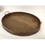 A 19thc oak oval galleried tray with twin brass handles to side (5cm x 53cm x 45cm)