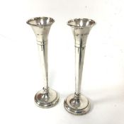 A pair of Continental silver tapered flower tubes raised on beaded circular bases, with later
