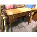 A 19thc mahogany ledgeback lift up desk, with later inset mirror, fitted two internal drawers and