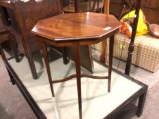 An Edwardian octagonal occasional table with inlaid border, on square tapered supports united by