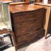 A reproduction mahogany serpentine batchelor's style chest, the top with crossbanded border above