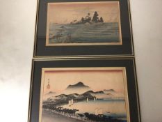 A pair of Japanese woodblock prints, highlighted with wash one depicting Seascapes the other with