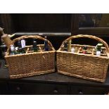 Two wicker spirit baskets complete with various spirits etc. (39cm x 43cm x 23cm), a walking stick