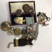 A mixed lot of jewellery etc., including 19thc mourning brooches, a white metal Masonic cased medal,