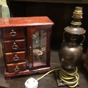 A miniature jewellery chest, a bronzed two handled lamp raised on square moulded base (29cm x