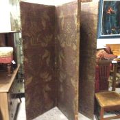 A 19thc four fold compressed paper acanthus leaf and urn style screen with handpainted naive style