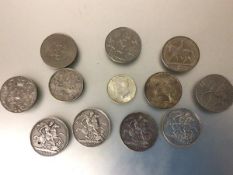 A collection of Victorian silver crowns including 1891, 1993, 1998 and 1900, an American silver