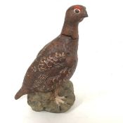 A Royal Doulton Matthew Gloag & Son Ltd., Perth pottery decanter in the form of a Grouse, with