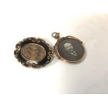 A Victorian yellow metal scalloped and enamelled plaited mourning brooch with engraved inscription