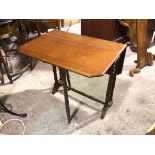 An Edwardian walnut Sutherland tea table, the rectangular top with twin drop flaps and cut