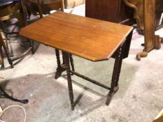 An Edwardian walnut Sutherland tea table, the rectangular top with twin drop flaps and cut