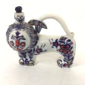 A Russian Lomonosov porcelain lion decanter figure, decorated in red, blue and gilt (15cm x 18cm)