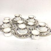 A Royal Crown Derby pink rose and fish scale bordered pattern thirty piece coffee set, including ten