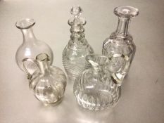 A 19thc triple ring neck decanter with hobnail cut panel, a 19thc thumb cut decanter (no stopper),