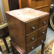 An Edwardian oak nest of six index drawers (44cm x 38cm x 43cm)