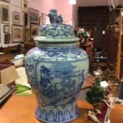 A modern Chinese craquelure baluster vase and cover with kylin finial to top, decorated with