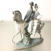 A Spanish Lladro porcelain figure group, Spanish Lady and Gentleman in Traditional Costume,