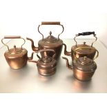 A 19thc collection of five various copper teapots, two with acorn finials, two with knop finials,
