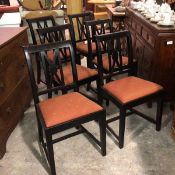 A set of twelve Utility pattern ebonised X splat back dining chairs with slip in seats, (sample of