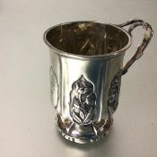 A William IV silver Christening mug, date letter and maker's mark indistinct, c.1835, with chased