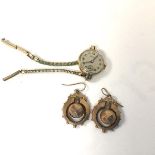 A pair of 10ct gold faceted ball drop Victorian earrings, with crescent shaped surrounds, stamped