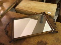 A burr walnut fretwork mirror, with moulded frame (70cm x 41cm)