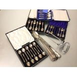 A set of twelve Sheffield silver apostle handled teaspoons in fitted case, Sheffield 1880, three