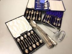 A set of twelve Sheffield silver apostle handled teaspoons in fitted case, Sheffield 1880, three