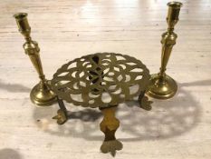 A pair of 19thc brass baluster candlesticks raised on circular moulded bases (29cm x 12cm to base)