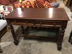 A 19thc mahogany side table, the rectangular top with moulded edge above two frieze drawers, on