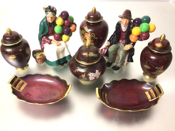A Royal Doulton china figure, The Old Balloon Seller, HN1315 and The Old Balloon Man, HN154,