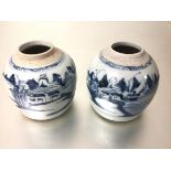 Two 19thc Chinese pottery ginger jars decorated with blue and white transfer landscape panels (